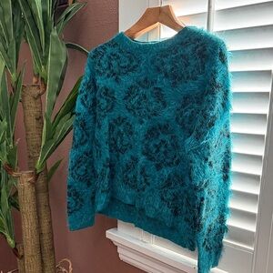 Woman’s steal sweater